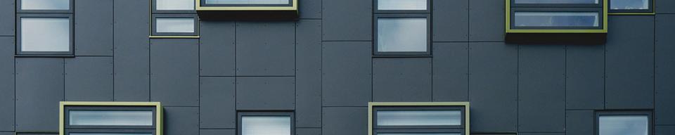 Black and yellow gold apartment block cladding